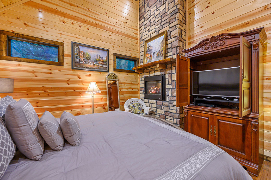 log cabin master bedrooms with fireplaces